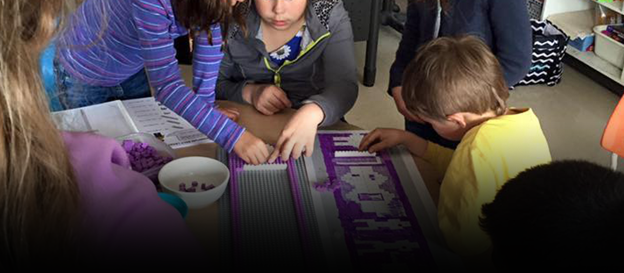 Banner photo of students doing beadwork