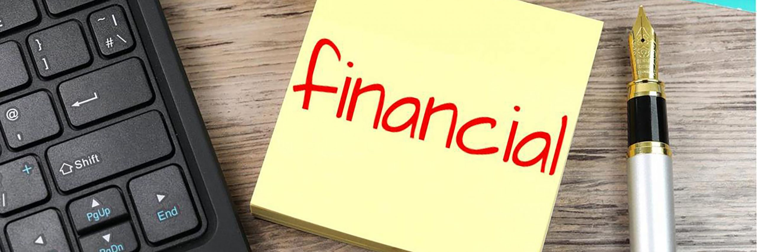 photo of financial written on post-it note
