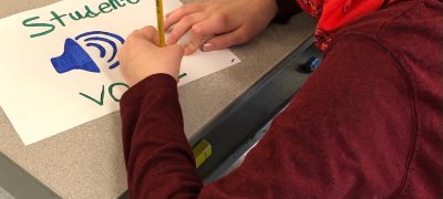 Easton McConnachie creates Student Voice logo.