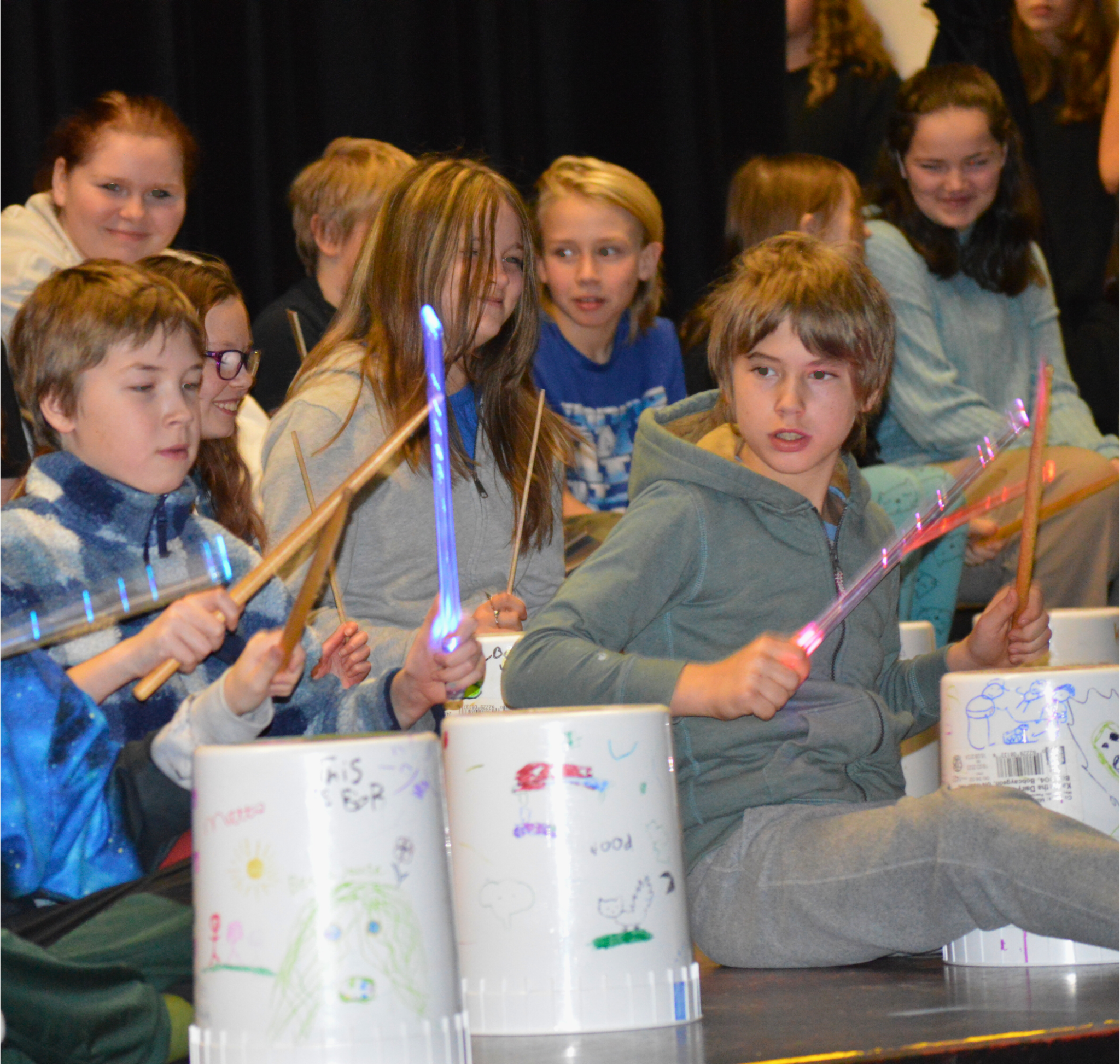 Young students drumming